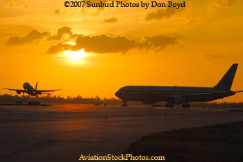 2007 - Northwest Airlines Airbus A-319 takeoff at sunset airline aviation stock photo #3080