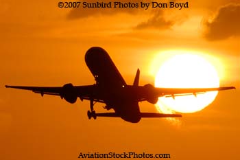 2007 - American Airlines B757-223 takeoff at sunset airline aviation stock photo #3084