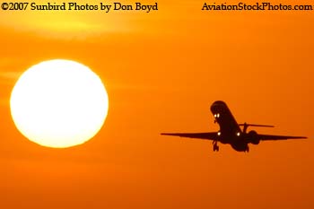 2007 - American Connection EMB-145 sunset aviation stock photo #3086