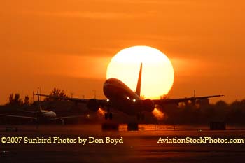 2007 - American Airlines B737-823 takeoff at sunset airline aviation stock photo #3090W