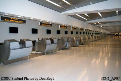 2007 - airline ticket counter positions at Miami International Airport's new South Terminal aviation stock photo #2241