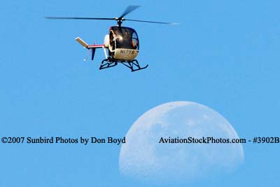 L J Air Corporation's Schweizer 269C N17YS helicopter and the moon aviation stock photo #3902B