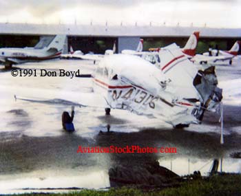 1991 - Piper PA28-151 N41306 destroyed by impact from Metro-Dade Aviation Department ramp car