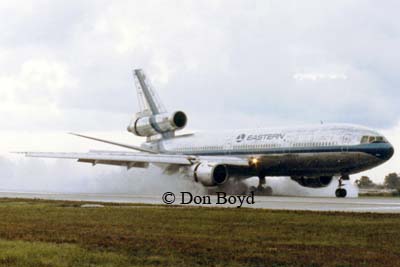 1980s - Eastern Airlines DC10-30 landing on wet runway at MIA