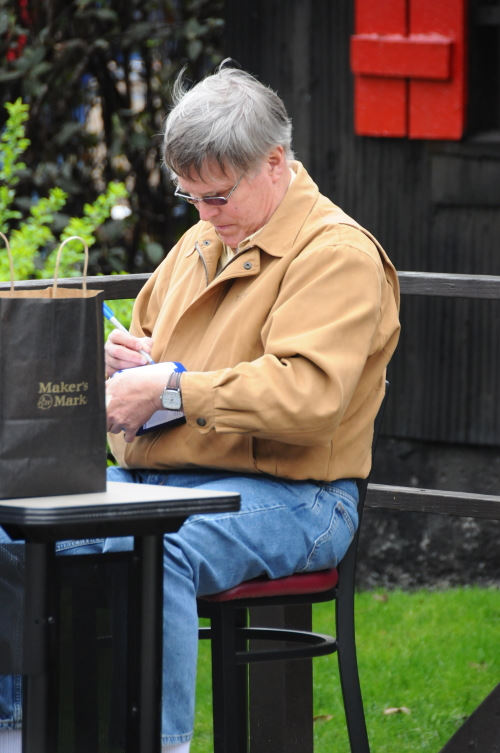 Bill Samuels signing the Makers Mark Bottles