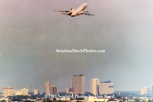 1983 - a Pan Am DC-10 climbing out over Miami after takeoff from runway 12 at MIA