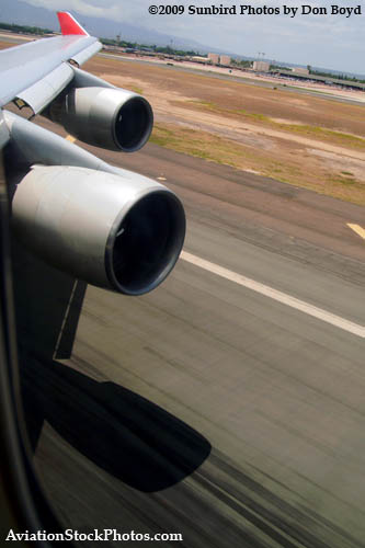 Touching down at Honolulu International Airport onboard Northwest flight 803 B747-451 N670US