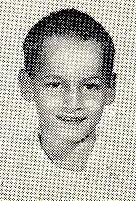 5660 W. 9th Lane - John Cheleotis in 1964 in his 1st grade photo