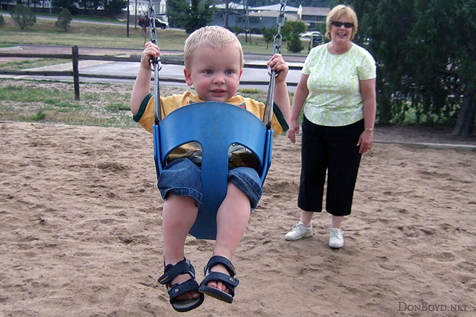 July 2007 - Kyler on the swings at Palmer Park