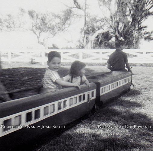 1964 - David and Nancy Joan Booth riding the kiddie train at Dressels Dairy on Milam Dairy Road in Dade County