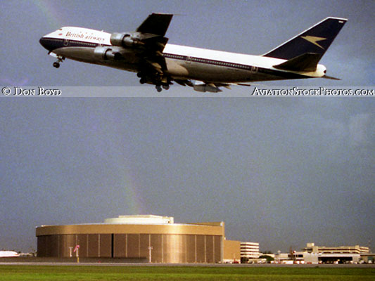 1975 - British Airways B747-100 taking off with the National Airlines Maintenance Base in the background