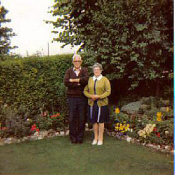 Mum & Dad in their back garden 1985