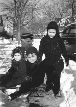 Richard (middle) at age three, playing with two kids in front of his apartment house at  410 Westminster Road in Brooklyn (1945)