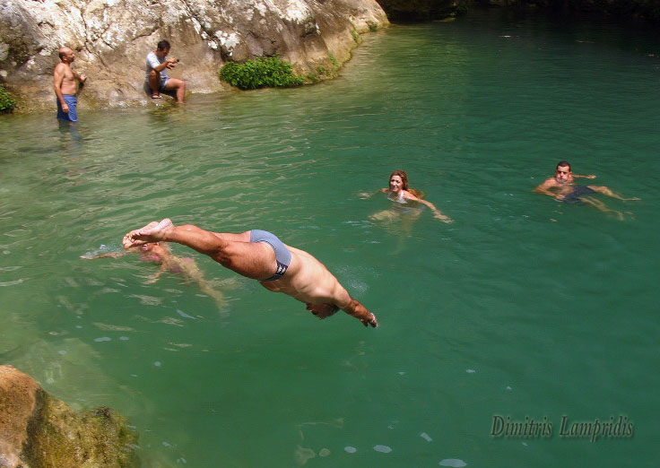 I dive into the icy waters ...