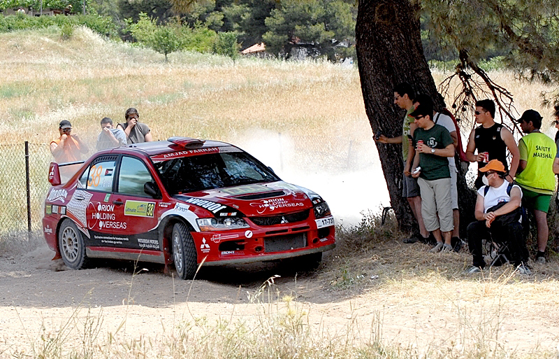 Juha Hanninen/Mikko Markkula  -  Mitsubishi Lancer Evo 9