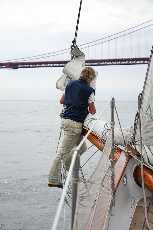 Packing sail down.