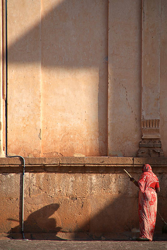 Sweeping Woman and Shadow Gol Gumbaz