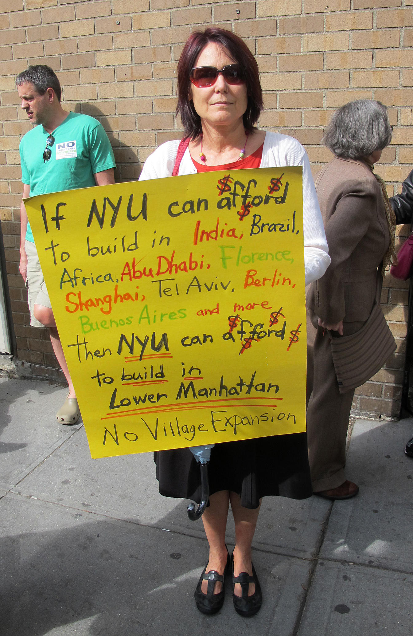 Protest Marcher Against the NYU2031 (De)Construction Plan and Movement