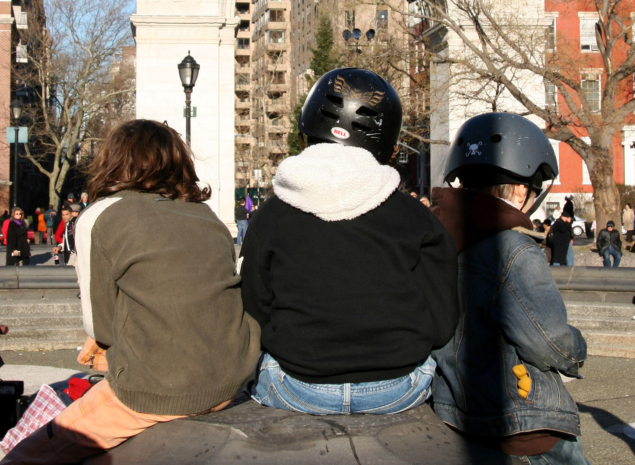 Three Buddies Watching a Performance at the Fountain