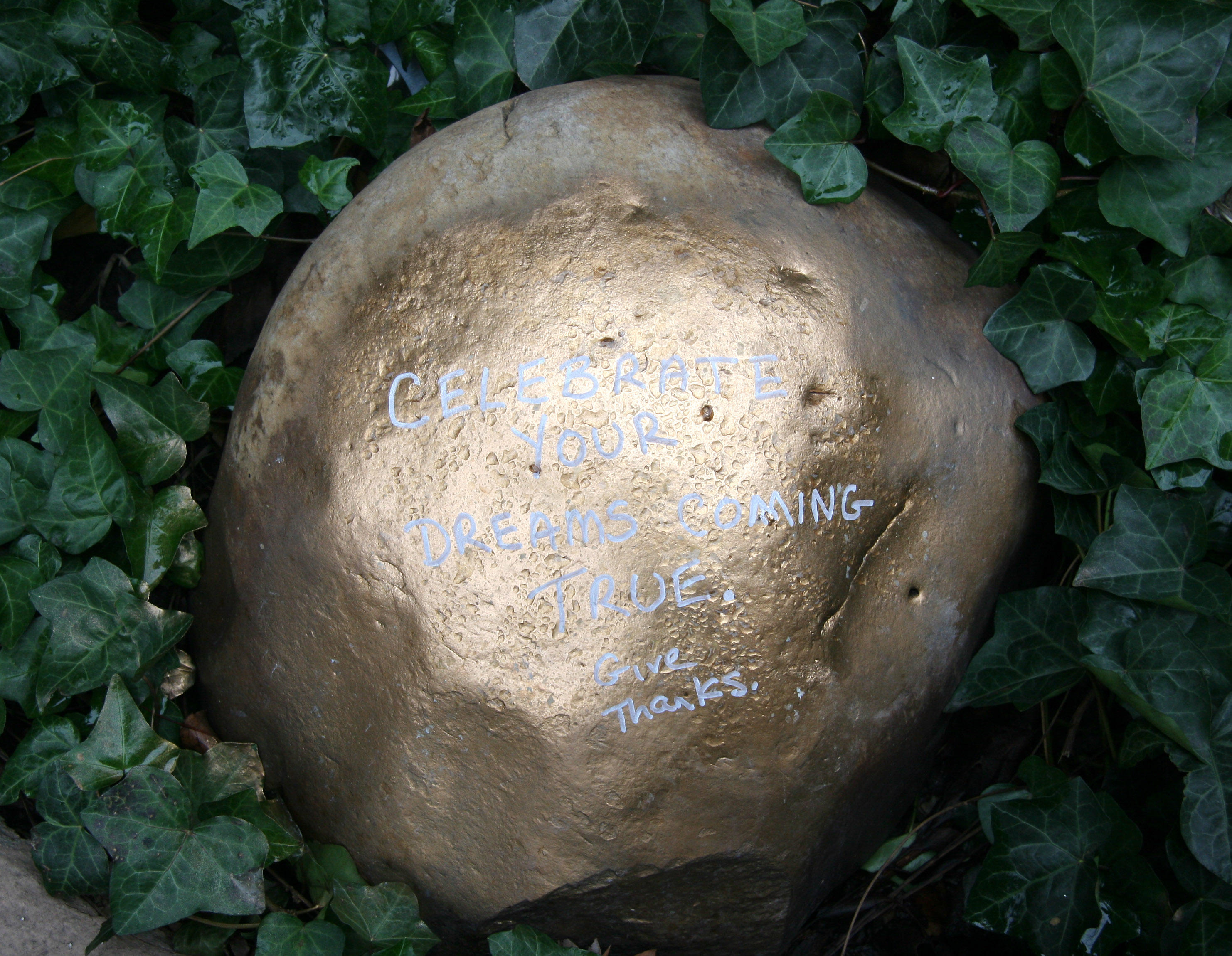 Sidewalk Garden - Message on a Golden Rock