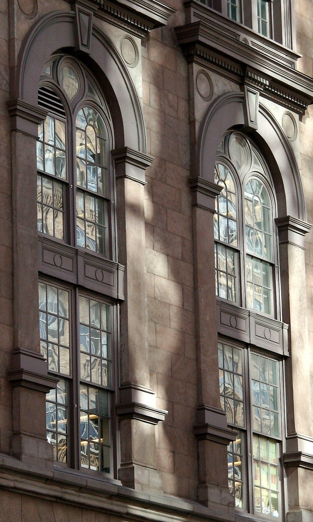 Cooper Union Hall with Glass Tower Building Reflections