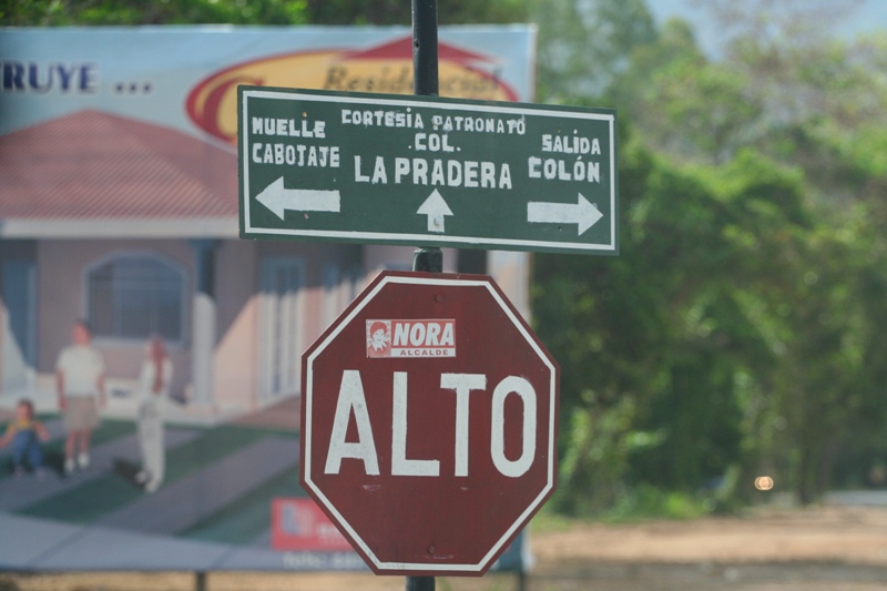 Stop sign with directions (and a campaign sticker for a lady running for mayor)