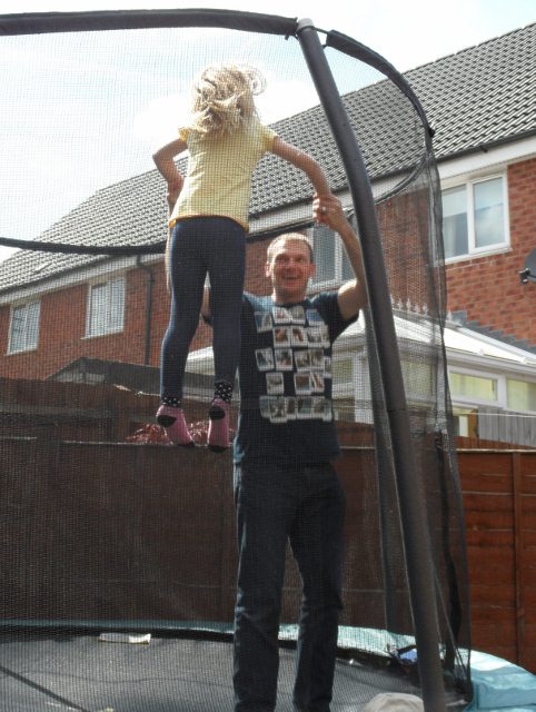 Jessica flying with the help of her dad