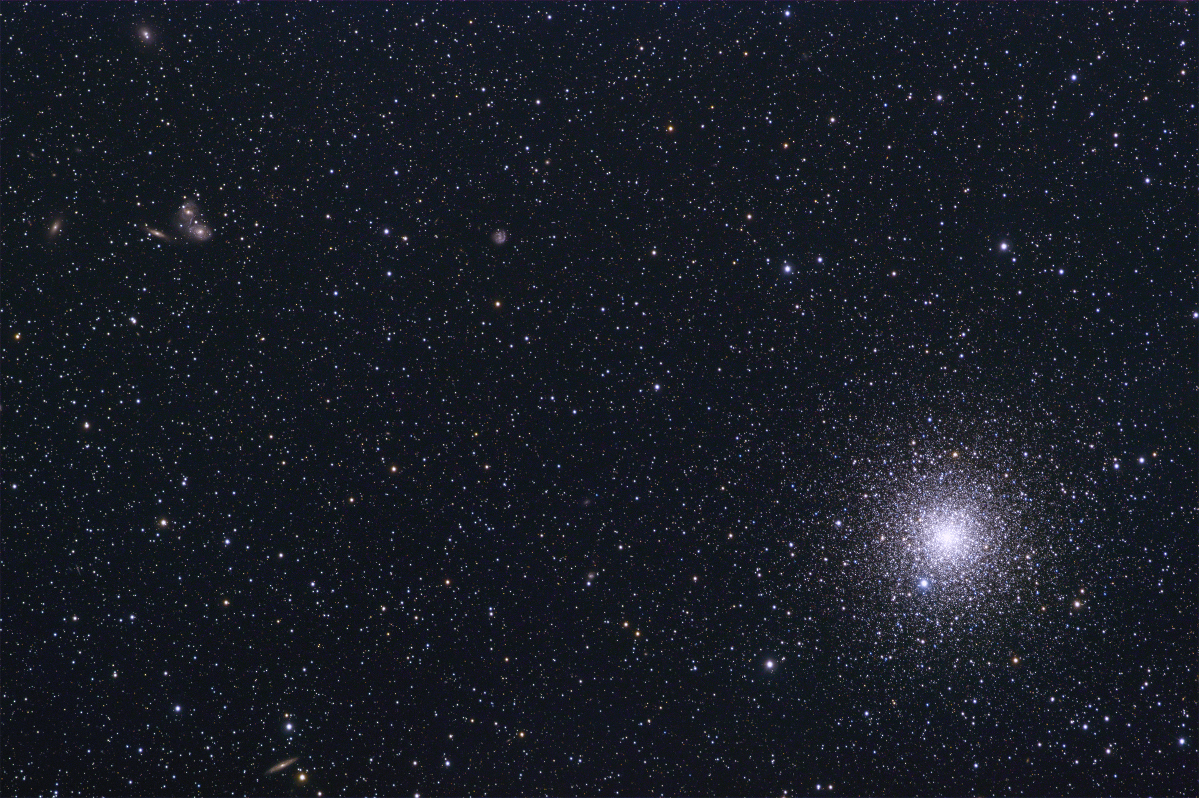 NGC 6752 and interacting galaxy group in Pavo (60% size)