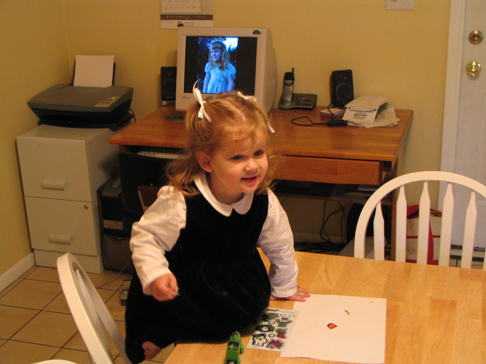 Eloise playing with stickers