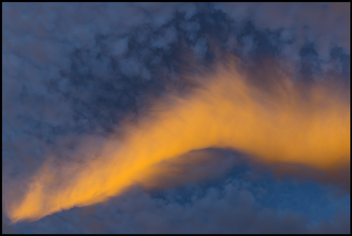 Underlightning of a cloud at dusk - land