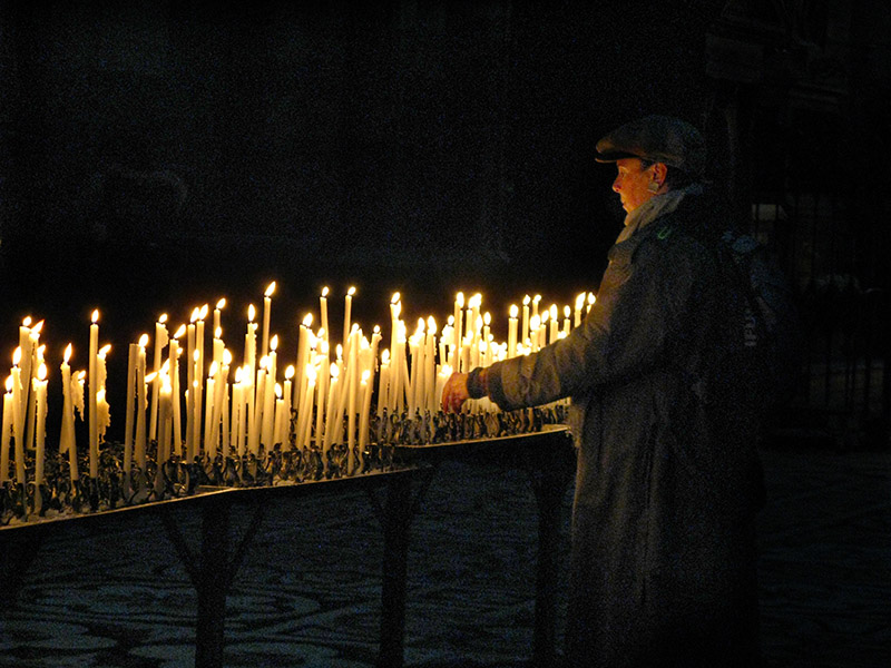 Inside the Duomo, lighting  a candle .. A1751