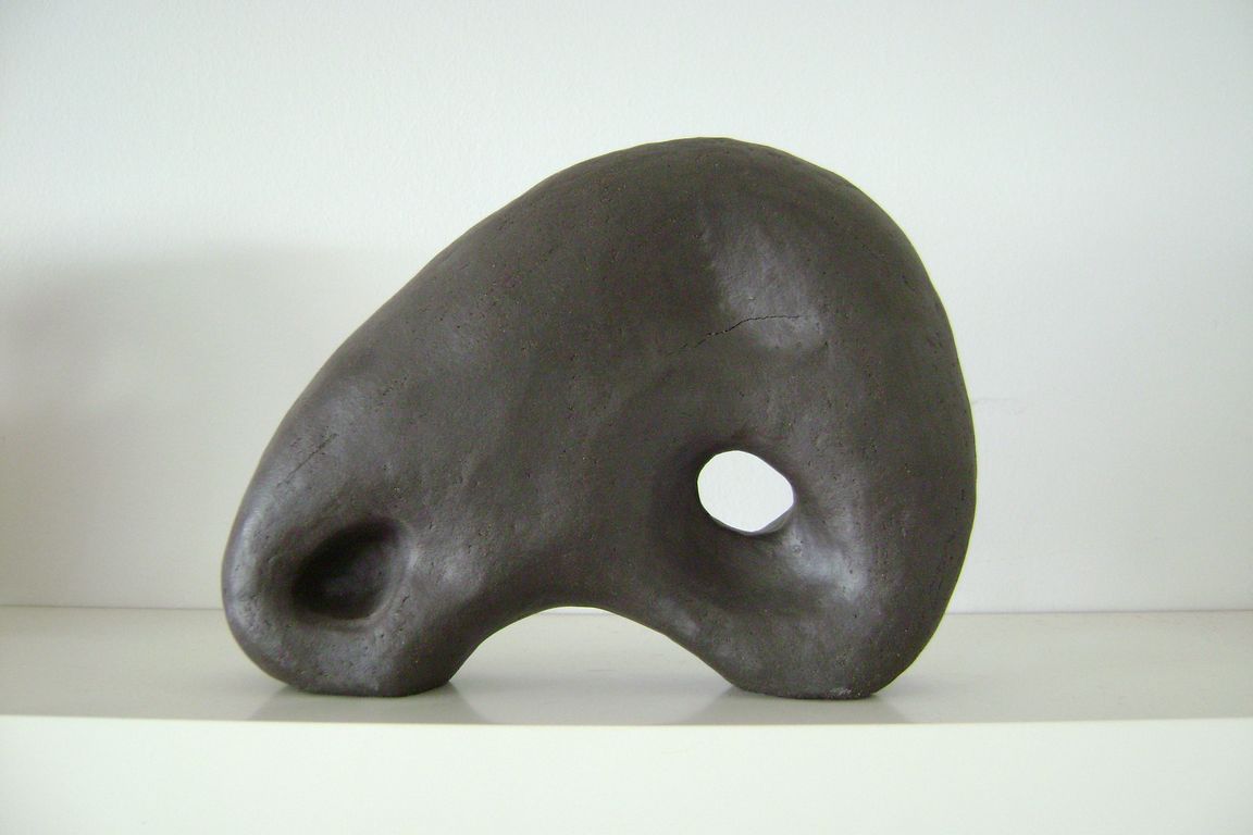 sea pebble, black clay, 30 x 20 cm