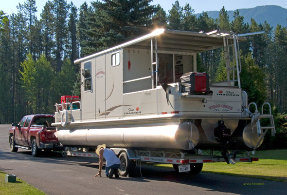 zP1010296 Caleb checks the boat trailer.jpg