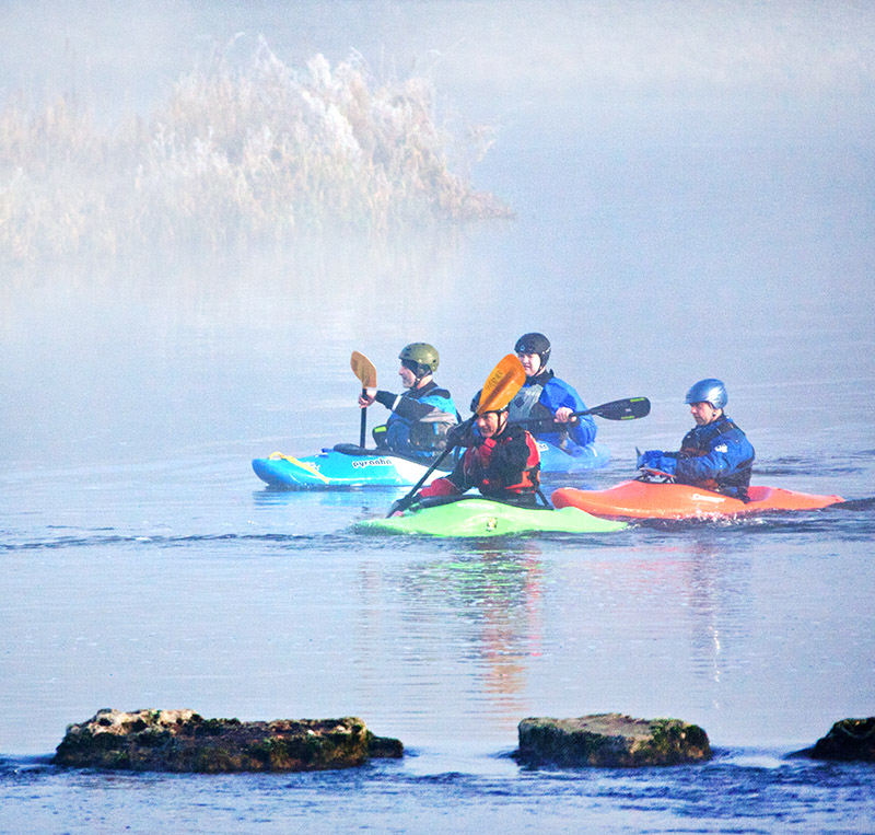 Kayaks in the Fog