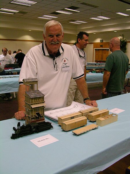 Chuck Faison & his scratchbuilt DRGW coaling tower and freight cars.