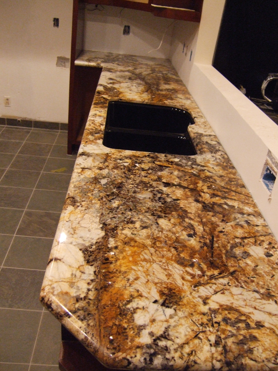 The counter tops begin to be placed.