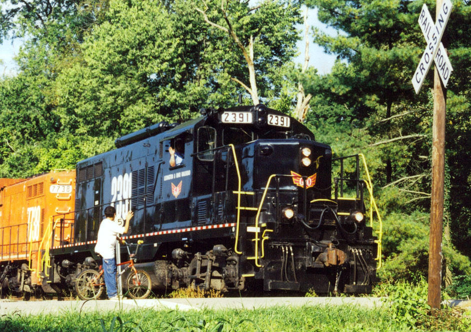 Engineer Gordon Brandenburg waves to Jay Burdette at Pisgah 