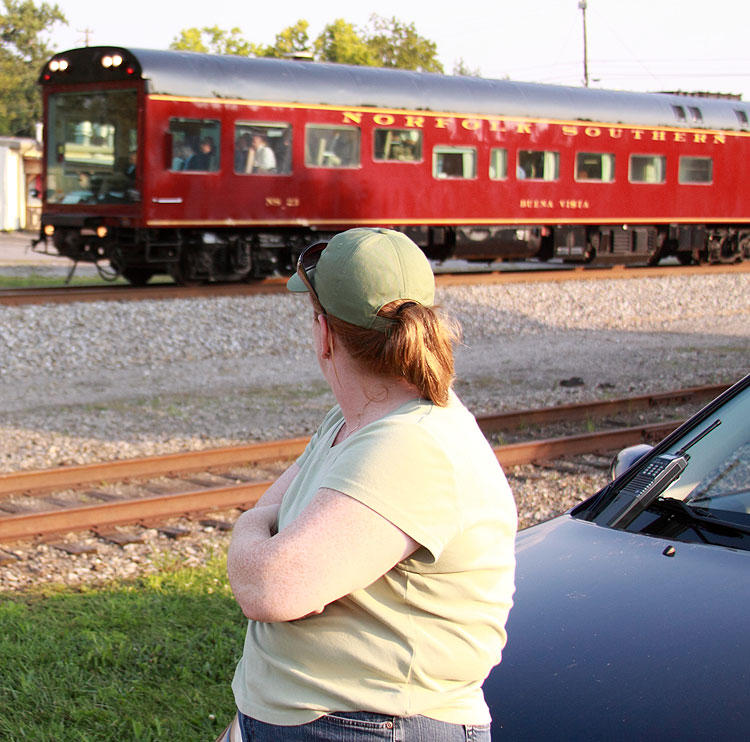 Carmon watches the OCS roll by