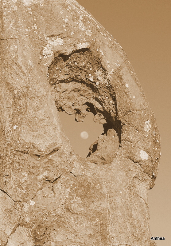 The moon through a pinnacle