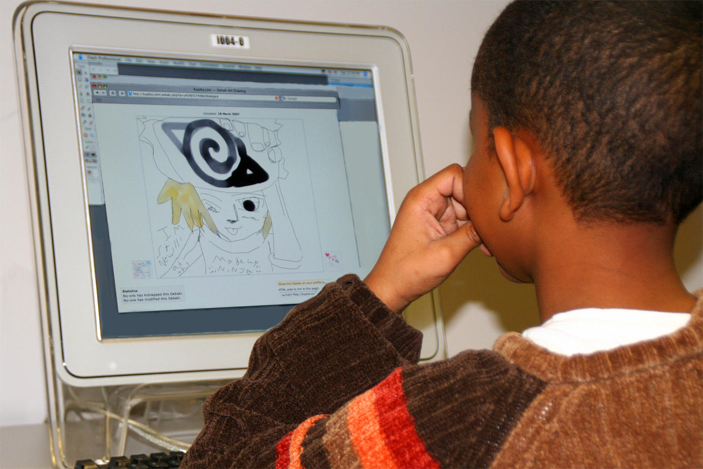 Joshua shows me his art