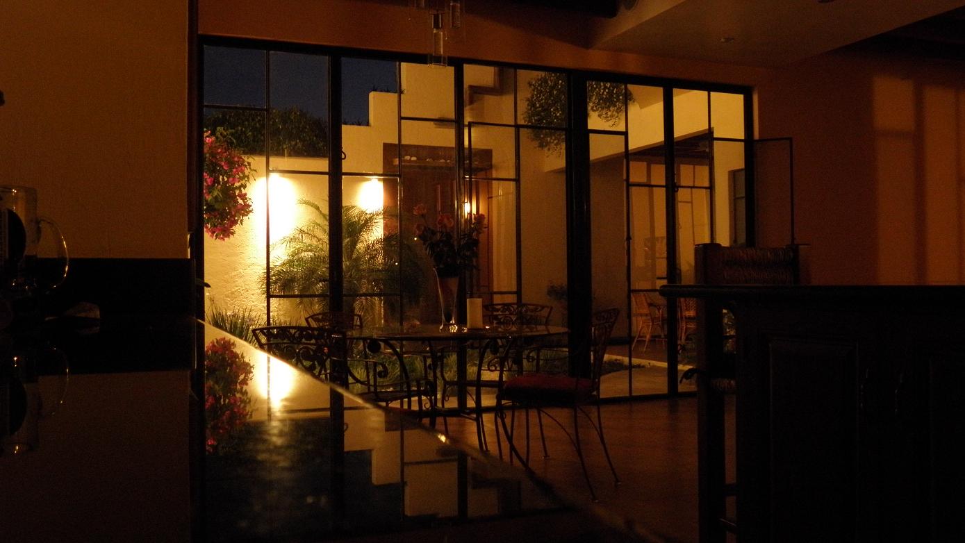 First level patio from inside at night