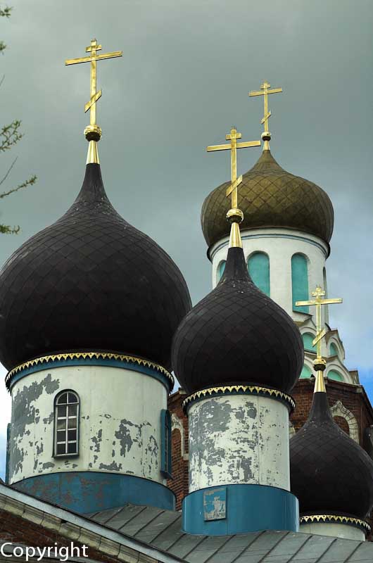 Onion domes and spires of a rural church