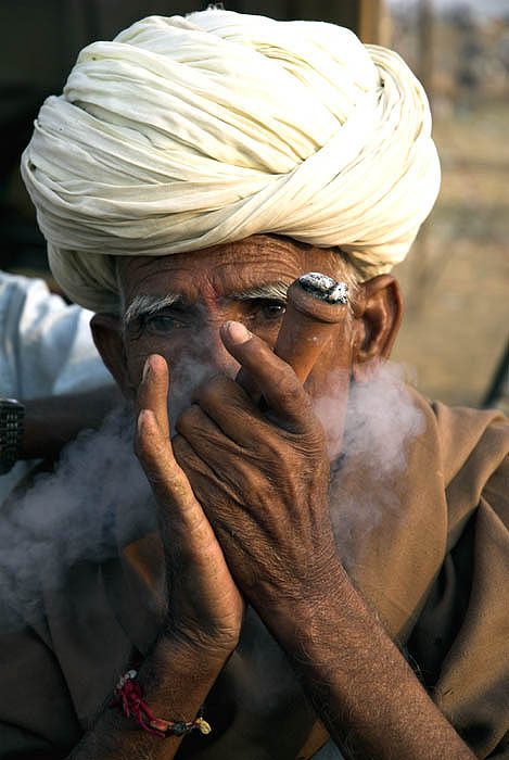 Smoking charas, Pushkar, India