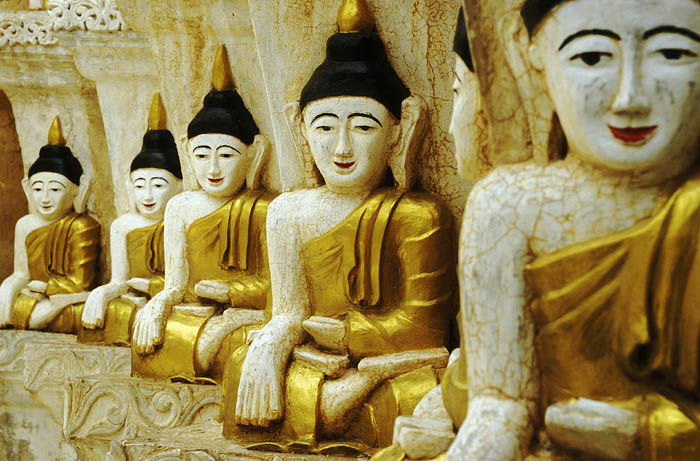 Buddha images in a ruined temple on the shores of Inle Lake