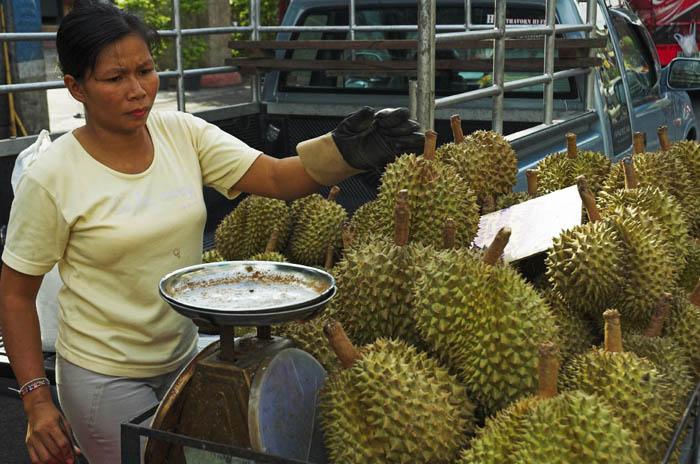 Selling durian, the notoriously odiferous tropical fruit