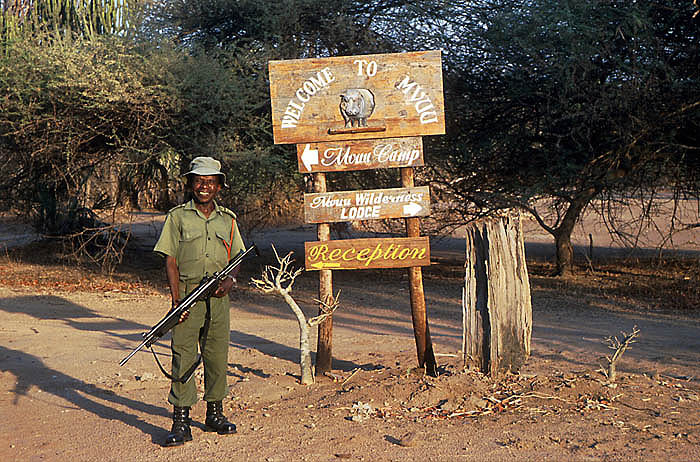 Guard with signpost at Mvuu Camp,  Liwonde National Park