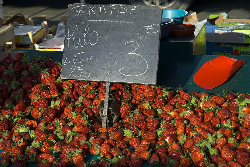 Strawberries for sale at a weekly market in Normandy