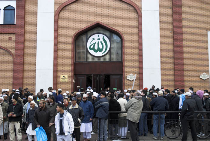 Leaving after prayers, East London Mosque