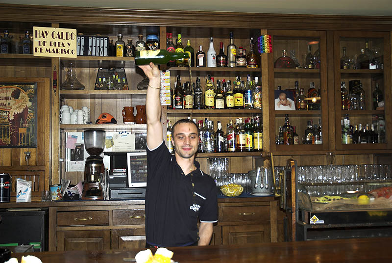 Pouring cider at a sidreria in Gijon, Asturias