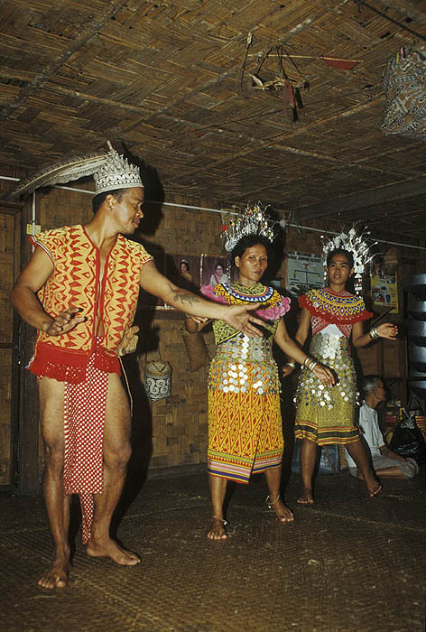 Dyak dancers at a longhouse